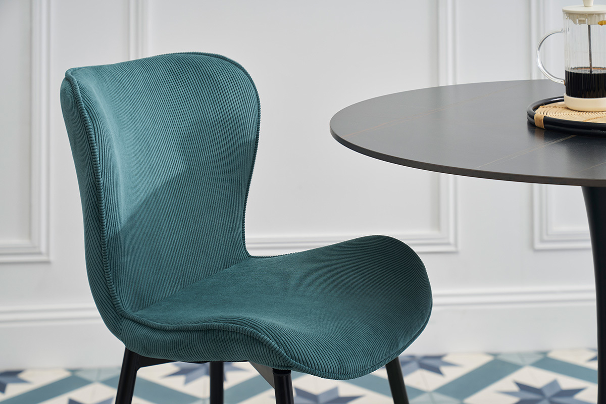 Chaise design en velours c�tel� bleu canard avec pieds en m�tal noir, vue de profil.