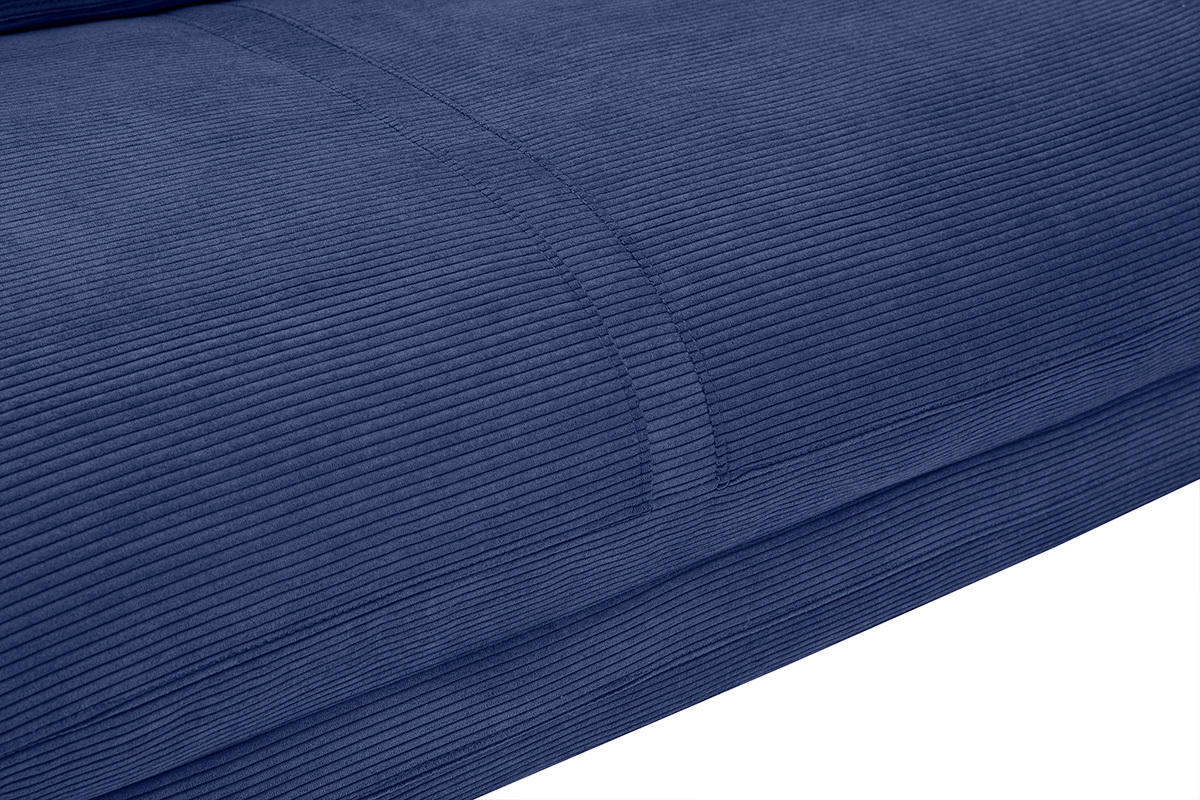 Gros plan sur le tissu velours c�tel� bleu fonc� de la chauffeuse SPENCER.