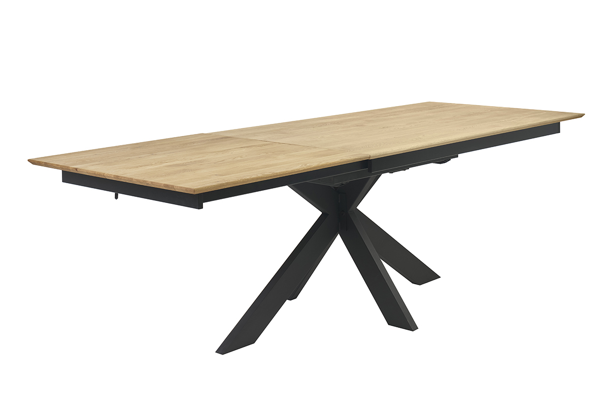 Table � manger extensible en bois clair ch�ne massif avec pi�tement crois� noir, vue de 3/4.