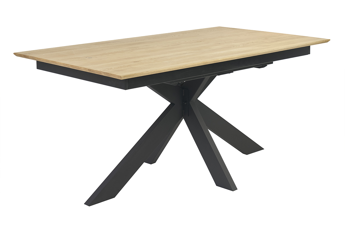 Table � manger en ch�ne clair avec pi�tement noir en croix, vue en angle.