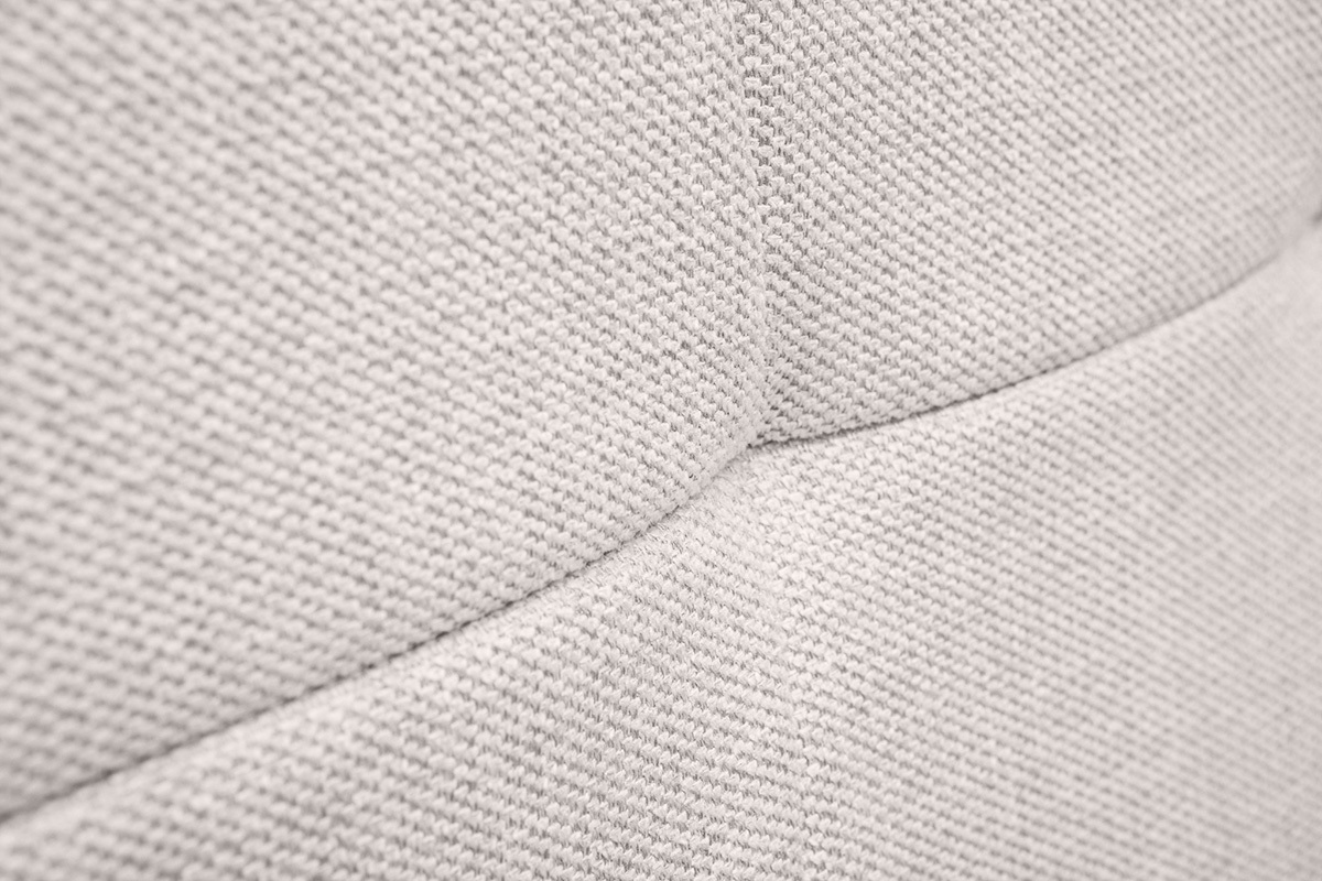 Gros plan sur le tissu effet velours textur� beige de la t�te de lit SUKA.