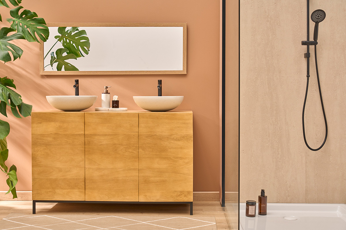 Vasque ronde en terrazzo gris LAORA D40 cm sur meuble de salle de bain en bois, vue de face.